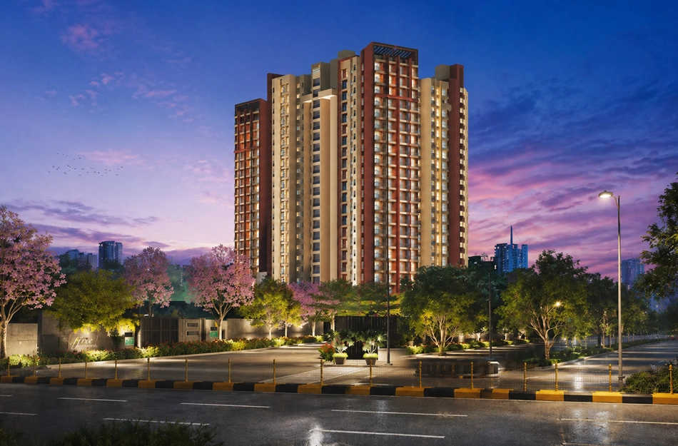 Residential tower at twilight with lit landscaping
